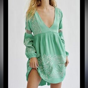 Elegant Green Dress with Silver Accents